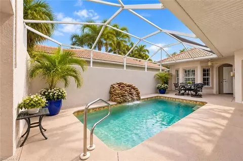 Exterior - 104 Glen Eagle Cir, Naples, FL 34104 photo 2 of 9