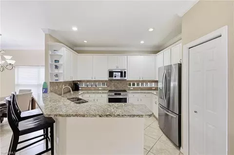 Kitchen - 104 Glen Eagle Cir, Naples, FL 34104 photo 2 of 4