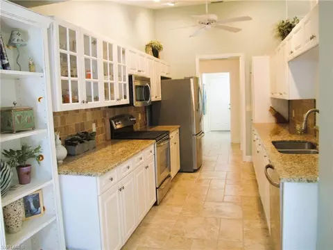 Kitchen - 3870 Midshore Dr, Naples, FL 34109 photo 2 of 3