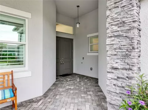 Exterior - 12239 Bonnet Dr, Naples, FL 34120 photo 3 of 11