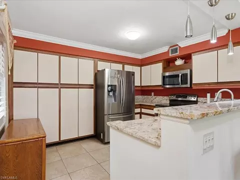 Kitchen - 221 Fox Glen Dr #2201, Naples, FL 34104 photo 3 of 3