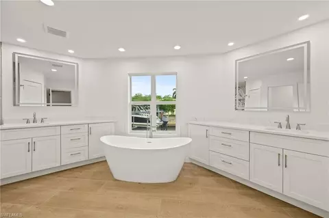 Bath - 2105 Sheepshead Dr, Naples, FL 34102 photo 1 of 7