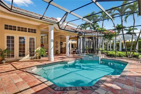 Exterior - 556 Eagle Creek Dr, Naples, FL 34113 photo 10 of 19