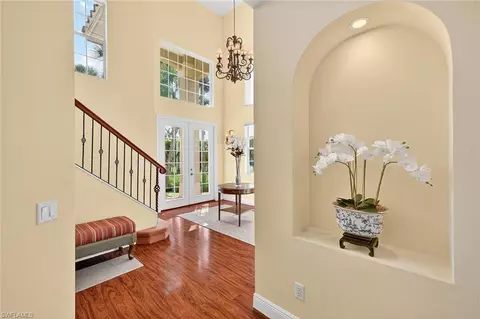 Entry Way - 556 Eagle Creek Dr, Naples, FL 34113 photo 1 of 3