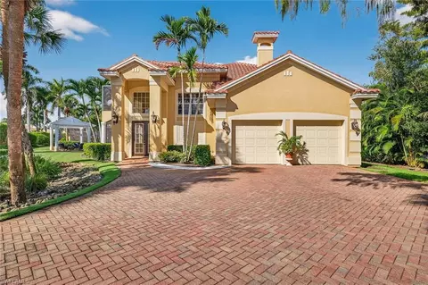 Exterior - 556 Eagle Creek Dr, Naples, FL 34113 photo 5 of 19