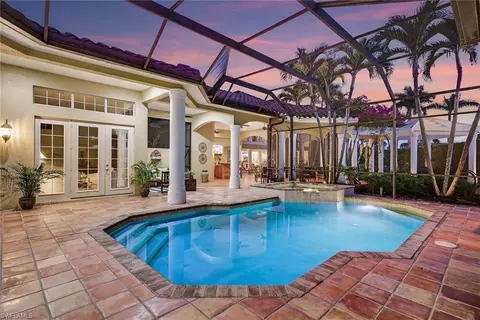 Exterior - 556 Eagle Creek Dr, Naples, FL 34113 photo 13 of 19