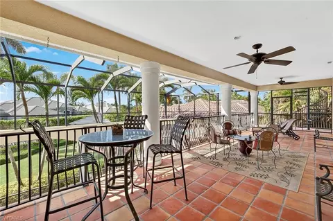Exterior - 556 Eagle Creek Dr, Naples, FL 34113 photo 17 of 19