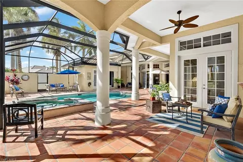 Exterior - 556 Eagle Creek Dr, Naples, FL 34113 photo 16 of 19