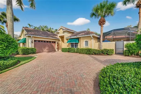 Exterior - 556 Eagle Creek Dr, Naples, FL 34113 photo 11 of 19