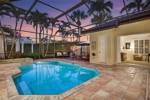 Exterior - 556 Eagle Creek Dr, Naples, FL 34113 photo 12 of 19