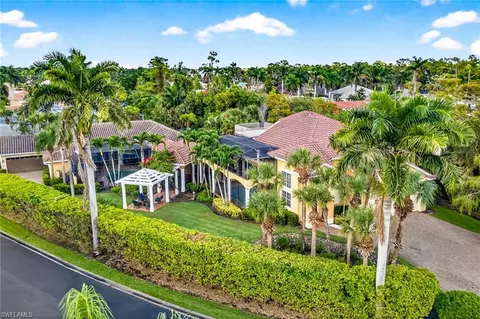 Exterior - 556 Eagle Creek Dr, Naples, FL 34113 photo 9 of 19