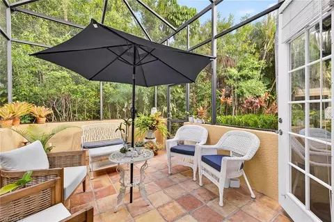 Exterior - 556 Eagle Creek Dr, Naples, FL 34113 photo 15 of 19