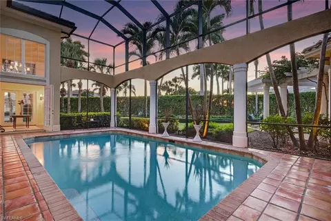 Exterior - 556 Eagle Creek Dr, Naples, FL 34113 photo 6 of 19