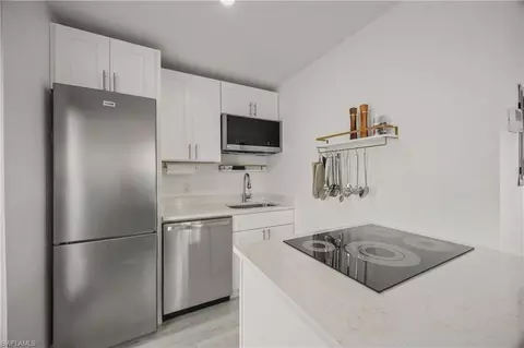 Kitchen - 683 100th Ave N, Naples, FL 34108 photo 3 of 5