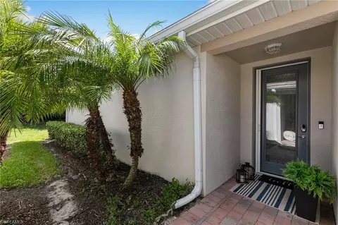 Exterior - 14731 Edgewater Cir, Naples, FL 34114 photo 6 of 8