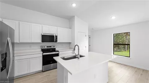 Kitchen - 742 Foxtail St E, Lehigh Acres, FL 33974 photo 1 of 3