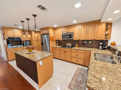 Kitchen - 113 Audubon Rd, Naples, FL 34114 photo 2 of 4