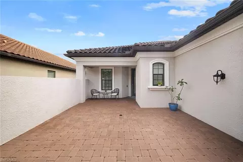 Exterior - 8461 Sevilla Ct, Naples, FL 34114 photo 7 of 12