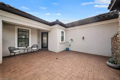 Exterior - 8461 Sevilla Ct, Naples, FL 34114 photo 4 of 12