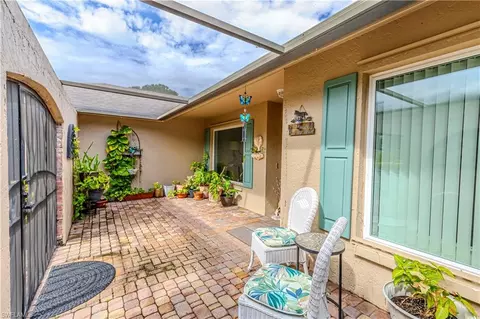 Exterior - 108 Payne Ct, Naples, FL 34112 photo 5 of 14