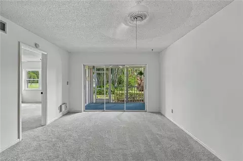 Living - 1056 Forest Lakes Dr #C112, Naples, FL 34105 photo 1 of 4