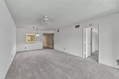Living - 1056 Forest Lakes Dr #C112, Naples, FL 34105 photo 4 of 4