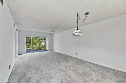 Living - 1056 Forest Lakes Dr #C112, Naples, FL 34105 photo 2 of 4