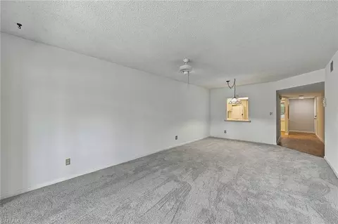 Living - 1056 Forest Lakes Dr #C112, Naples, FL 34105 photo 3 of 4