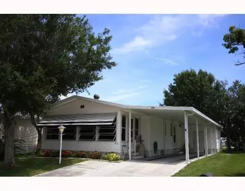 1210 Apache Dr, Barefoot Bay, FL 32976 photo 1