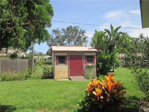 9875 Honeysuckle Dr, Micco, FL 32976 photo 4