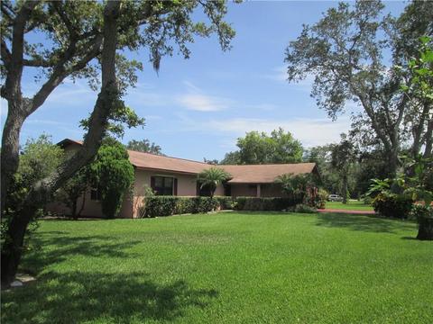 9875 Honeysuckle Dr, Micco, FL 32976 photo 2