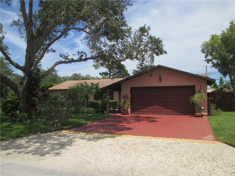 9875 Honeysuckle Dr, Micco, FL 32976 photo 1