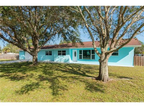 9845 Honeysuckle Dr, Micco, FL 32976 photo 1
