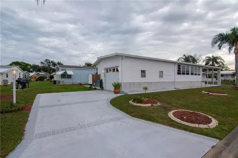 100 Hydrangea Ct, Barefoot Bay, FL 32976 photo 5