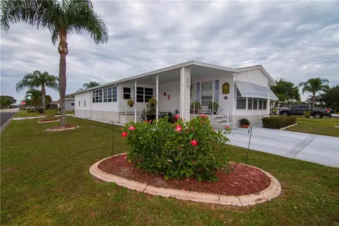 100 Hydrangea Ct, Barefoot Bay, FL 32976 photo 1