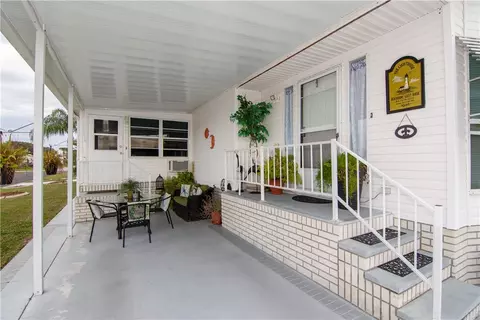 100 Hydrangea Ct, Barefoot Bay, FL 32976 photo 3