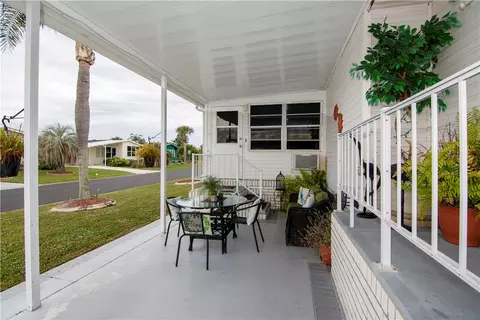 100 Hydrangea Ct, Barefoot Bay, FL 32976 photo 4