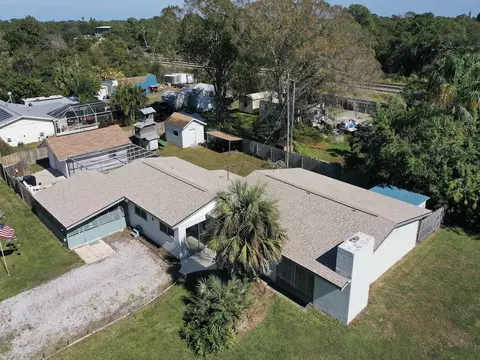 9425 Honeysuckle Dr, Micco, FL 32976 photo 1