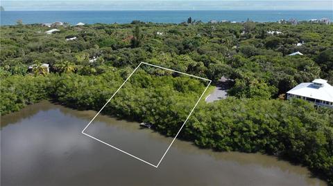 124 Seagrape Rd, Melbourne Beach, FL 32951 photo 1