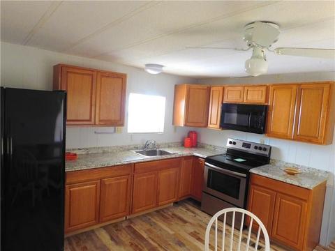 402 Eagle Dr, Barefoot Bay, FL 32976 photo 9