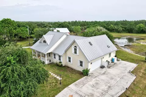 9335 Fleming Grant Rd, Micco, FL 32976 photo 1
