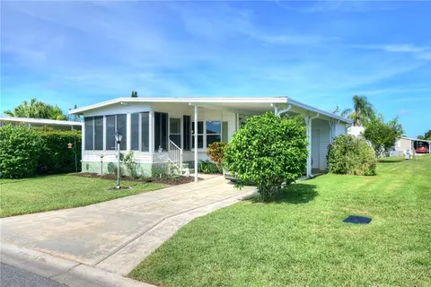 912 Oriole Cir, Barefoot Bay, FL 32976