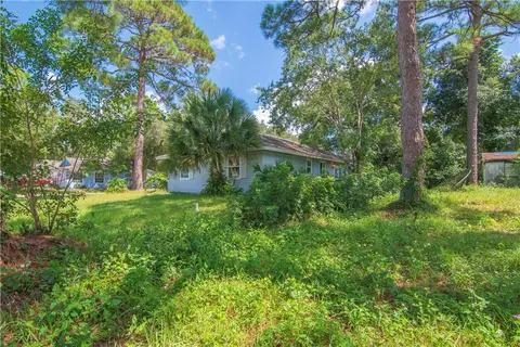 Exterior - 8775 24th St, Vero Beach, FL 32966 photo 2 of 10