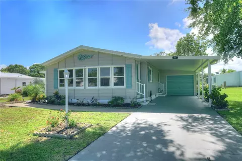 911 Yew St, Barefoot Bay, FL 32976