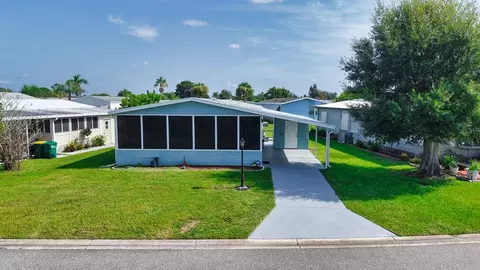 926 Frangi Pani Dr, Barefoot Bay, FL 32976