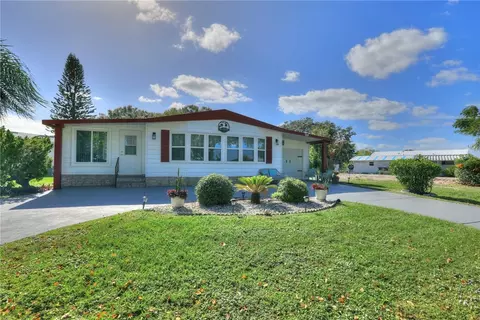 719 Hyacinth Cir, Barefoot Bay, FL 32976