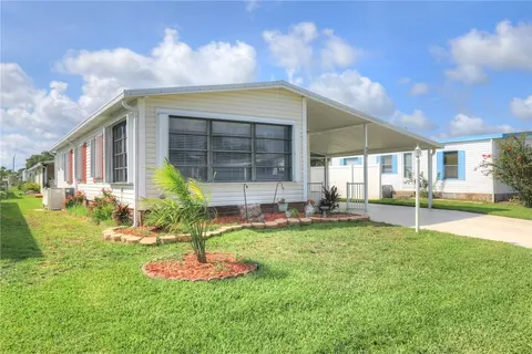 909 Jacaranda Dr, Barefoot Bay, FL 32976