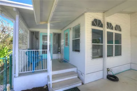 295 Papaya Cir, Barefoot Bay, FL 32976