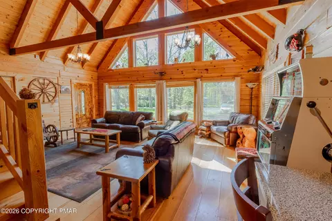 Living - 1160 Bluebird Ln, Bushkill, PA 18324 photo 2 of 2