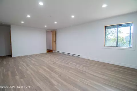 Living - 1142 Yorkshire Ln, Bushkill, PA 18324 photo 6 of 10